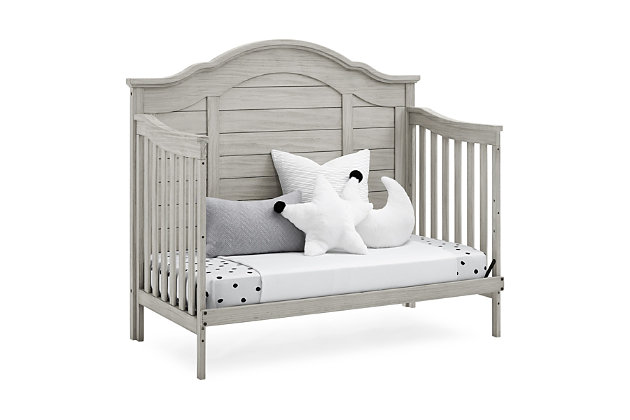 The elegant curves and shiplap-inspired headboard of the Asher 6-in-1 Convertible Baby Crib by Simmons Kids are brought to life with a lightly textured finish. A great option for your baby's nursery, this convertible crib features a dramatic silhouette that will make it the focal point of any bedroom for years to come. Its grow-with-me design features three adjustable height levels that allow the crib to be lowered as your child grows, plus it converts from a crib, to a toddler bed, sofa, daybed, full size bed with headboard or full size bed with headboard and footboard. The only bed your little one will ever need, this versatile crib will take you from the nursery to high school, and all the years in between. Toddler Guardrail included; Full Size Bed Rails sold separately. Given the hand applied nature of this baby crib’s finish, variations in the wood are to be expected and celebrated.  Producing the finest furniture for over 80 years, Simmons Kids has always been committed to the safety of every family. All Simmons Kids cribs are JPMA certified, are rigorously tested to meet or exceed all industry safety standards.Safe option for your baby: this crib is jpma certified to meet or exceed all safety standards set by the cpsc & astm; we know chemicals have no place in your nursery, so we use a non-toxic multi-step painting process that is lead and phthalate safe | 6-in-1 convertible crib: crib converts to toddler bed, daybed, sofa, a full size bed with headboard and footboard and full size bed with headboard only; daybed/sofa/toddler guardrail kit included (full size wood bed rails #330750 or full size metal bed frame #0040 sold separately); available in rustic mist or rustic grey. Crib features a softy textured finish that’s hand applied | Adjustable height: adjustable height mattress support with 3 convenient positions to grow with your baby | Coordinating items: pair with the asher 6 drawer dresser with changing top for the perfect baby nursery, uses a standard size crib mattress (sold separately) to ensure the perfect fit pair your crib with a delta children, serta, beautyrest or simmons kids crib mattress | Quality material: made of sustainable woods like new zealand pine and tsca compliant engineered wood tested for lead and other toxic elements to meet or exceed government and astm safety standards | Size: assembled dimensions: 56.75"w x 31"d x 49.5"h, easy assembly