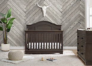 The elegant curves and shiplap-inspired headboard of the Asher 6-in-1 Convertible Baby Crib by Simmons Kids are brought to life with a lightly textured finish. A great option for your baby's nursery, this convertible crib features a dramatic silhouette that will make it the focal point of any bedroom for years to come. Its grow-with-me design features three adjustable height levels that allow the crib to be lowered as your child grows, plus it converts from a crib, to a toddler bed, sofa, daybed, full size bed with headboard or full size bed with headboard and footboard. The only bed your little one will ever need, this versatile crib will take you from the nursery to high school, and all the years in between. Toddler Guardrail included; Full Size Bed Rails sold separately. Given the hand applied nature of this baby crib’s finish, variations in the wood are to be expected and celebrated.  Producing the finest furniture for over 80 years, Simmons Kids has always been committed to the safety of every family. All Simmons Kids cribs are JPMA certified, are rigorously tested to meet or exceed all industry safety standards.assembled dimensions: 56.75"w x 31"d x 49.5"h; easy assembly | 6-IN-1 CONVERTIBLE CRIB: Crib converts to toddler bed, daybed, sofa, a full size bed with headboard and footboard and full size bed with headboard only | Daybed/Sofa/Toddler Guardrail Kit Included  (Full Size Wood Bed Rails #330750 or Full Size Metal Bed Frame #0040 Sold Separately) | Available in Rustic Mist or Rustic Grey | Crib features a softy textured finish that’s hand applied  | Adjustable height: adjustable height mattress support with 3 convenient positions to grow with your baby | Coordinating items: pair with the asher 6 drawer dresser with changing top for the perfect baby nursery; uses a standard size crib mattress (sold separately); to ensure the perfect fit pair your crib with a delta children, serta, beautyrest or simmons kids crib mattress | Quality material: made of sustainable woods like new zealand pine and tsca compliant engineered wood; tested for lead and other toxic elements to meet or exceed government and astm safety standards