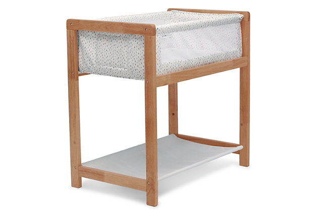Enjoy peaceful moments from naptime to nighttime with the Classic Wood Bedside Bassinet Sleeper by Delta Children. It features a solid wood frame and gender-neutral pattern that complements any décor. A safe and comfortable place to sleep anywhere in your home, this bassinet is lightweight enough to be easily moved from room to room. Mesh sides allow generous airflow and a large storage shelf keeps necessities within reach. This bassinet is recommended for babies 0-5 months. Max weight 30 lbs. Stop use at 5 months or once your infant begins to push up on their hands and knees, whichever comes first.   Delta Children was founded around the idea of making safe, high-quality children's furniture affordable for all families. They know there's nothing more important than safety when it comes to your child's space. That's why all Delta Children products are built with long-lasting materials to ensure they stand up to years of use. Plus, they are rigorously tested to meet or exceed all industry safety standards.Keeps baby close: this timeless baby bassinet with solid wood base and legs keeps baby safely by your bedside;  neutral design is ideal for boys or girls; made of sustainable new zealand pine wood | Airflow mesh: breathable mesh on sides promote airflow and cooler sleep environment for baby | Tons of storage: large storage shelf under the frame keeps baby’s necessities within reach | Size: assembled dimensions: 33”l x 20.5”w x 32“h; bassinet includes 1-inch waterproof mattress pad and fitted bassinet sheet | We put your baby's safety first: jpma certified to meet or exceed all safety standards set by the cpsc and astm; we know chemicals have no place in your nursery, so we use a non-toxic multi-step painting process that is lead and phthalate safe