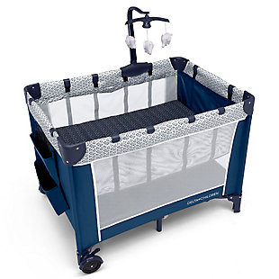 Keep your baby safe, close and comfy with the LX Deluxe Play Yard from Delta Children. You'll love all the convenient features-the removable bassinet provides the ideal spot for naptime or bedtime, and the removable changing table means you'll always have a sturdy place to change diapers or dress your baby. The detachable storage compartment keeps changing necessities nearby, so you never have to run to another room for diapers or wipes. When your baby outgrows the bassinet, the insert is removable and the LX Deluxe Play Yard functions like a full size playard. Large mesh sides provide optimal ventilation while also permitting a clear view. Designed to use at home or away, the play yard's wheels make it super-easy to move around the house, and the quick fold construction and included carry bag make for fuss-free travel. The LX Deluxe Play Yard from Delta Children features everything needed for a nursery in a portable design. Delta Children was founded around the idea of making safe, high-quality children's furniture affordable for all families. They know there's nothing more important than safety when it comes your child's space. That's why all Delta Children products are built with long-lasing materials to ensure they stand up to years of jumping and playing. Plus, they are rigorously tested to meet or exceed all industry safety standards.RECOMMENDED USE: Deluxe Play Yard features a removable full size bassinet and changing table; Bassinet holds up to 15 pounds; Changing Table holds up to 25 pounds; Play Yard holds children up to 35 Inches tall | FUN FOR BABY, EASY FOR YOU: Removable mobile arm with hanging plush toys engages early visual development; Removable changing table station features waterproof surface; Snap on hanging storage compartment for diapers, wipes and other toiletries | TRAVEL FRIENDLY: Quick and compact fold; Includes carrying bag for fuss free travel or storage; Easy to pack; Great mini crib alternative; Two wheels allow for easy movement from room to room; Easy to assemble; no tools required | SIZE: Assembled dimensions: 27.75"L x 37.4"W x 40.2"H  | YOUR BABY’S SAFETY IS OUR FIRST PRIORITY: JPMA certified to meet or exceed all safety standards set by the CPSC and ASTM