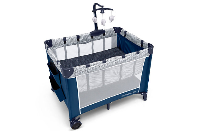Keep your baby safe, close and comfy with the LX Deluxe Play Yard from Delta Children. You'll love all the convenient features-the removable bassinet provides the ideal spot for naptime or bedtime, and the removable changing table means you'll always have a sturdy place to change diapers or dress your baby. The detachable storage compartment keeps changing necessities nearby, so you never have to run to another room for diapers or wipes. When your baby outgrows the bassinet, the insert is removable and the LX Deluxe Play Yard functions like a full size playard. Large mesh sides provide optimal ventilation while also permitting a clear view. Designed to use at home or away, the play yard's wheels make it super-easy to move around the house, and the quick fold construction and included carry bag make for fuss-free travel. The LX Deluxe Play Yard from Delta Children features everything needed for a nursery in a portable design. Delta Children was founded around the idea of making safe, high-quality children's furniture affordable for all families. They know there's nothing more important than safety when it comes your child's space. That's why all Delta Children products are built with long-lasing materials to ensure they stand up to years of jumping and playing. Plus, they are rigorously tested to meet or exceed all industry safety standards.Recommended use: deluxe play yard features a removable full size bassinet and changing table; bassinet holds up to 15 pounds; changing table holds up to 25 pounds; play yard holds children up to 35 inches tall | Fun for baby, easy for you: removable mobile arm with hanging plush toys engages early visual development; removable changing table station features waterproof surface; snap on hanging storage compartment for diapers, wipes and other toiletries | Travel friendly: quick and compact fold; includes carrying bag for fuss free travel or storage; easy to pack; great mini crib alternative; two wheels allow for easy movement from room to room; easy to assemble; no tools required | Size: assembled dimensions: 27.75"l x 37.4"w x 40.2"h | Your baby’s safety is our first priority: jpma certified to meet or exceed all safety standards set by the cpsc and astm