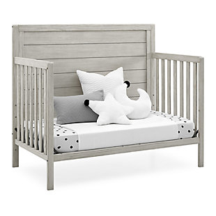 The Cambridge 4-in-1 Convertible Baby Crib by Delta Children helps make your baby's nursery a true expression of your style. This baby crib showcases clean lines and a distressed, textured finish that comes together to create the perfect yin and yang between rugged and refined. A one-of-a-kind option for your little one, the Cambridge 4-in-1 Convertible Baby Crib is designed with a solid headboard that's accented with shiplap-inspired horizontal planks that instantly brings warmth and character to any baby's room. A welcome spot for sweet dreams for years to come, this crib allows you to easily lower the mattress support to any of the three height levels to accommodate your child as they begin to sit or stand. And to make sure it's the only bed your child will need in their lifetime, it easily adapts from a crib to a toddler bed, a daybed, and a full size bed. Delta Children was founded around the idea of making safe, high-quality cribs affordable for all families. That's why all Delta Children cribs are JPMA certified, and are tested above and beyond industry standards.The safest option for your baby: this crib is jpma certified to meet or exceed all safety standards set by the cpsc & astm. We know chemicals have no place in your nursery, so we use a non-toxic multi-step painting process that is lead and phthalate safe | 4-in-1 convertible crib: crib converts to toddler bed, daybed, sofa, a full size platform style bed with headboard and footboard and a full size bed with headboard only (toddler guardrail #701725, full size wood platform bed kit #700850 or full size metal bed frame #0040 sold separately). Available in rustic mist. Crib features a softy textured finish that’s hand applied | Adjustable height: adjustable height mattress support with 3 convenient positions to grow with your baby |access rail heights: from floor - 35.75" from bottom mattress support position - 26.50" from top mattress support position - 19" | Coordinating items: pair with the cambridge 3 drawer dresser with changing top for the perfect baby nursery. Uses a standard size crib mattress (sold separately). To ensure the perfect fit pair your crib with a delta children, serta, beautyrest or simmons kids crib mattress | Quality material: made of sustainable new zealand pine wood and tsca compliant engineered wood. Tested for lead and other toxic elements to meet or exceed government and astm safety standards | Size: assembled dimensions: 55"w x 29.5"d x 46.25"h. Easy assembly