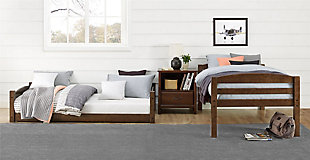 Sleep in style with the customizable, space-saving design of the Atwater Living Aaida Bunk Bed. The increased sleeping capacity is common sense solution for cottages, extended family, out-of-town guests or hosting your child’s rambunctious friends for a sleepover. The Aaida features a mocha finish, clean lines and horizontal slats with a built-in stepladder to access the top bunk. Each bed features its own personal space with easy dependable access in and out. The ultimate space-saver, the Aaida’s multiple configurations also allow it to be set up as a traditional bunk bed or simply as two separate twin beds. The unique floor bunk bed design will allow you to maximize your space while the sturdy, solid construction adds both durability and functionality. Fun, safe and stylish, the Atwater Living Aaida Twin Bunk Bed is the perfect antidote for sleeping multiple people in smaller spaces.Made of wood and engineered wood | Transitional twin size bunk bed made with a solid wood construction. | Easily converts into two separate twin size beds. Each bed is designed to accommodate a standard twin size mattress (sold separately). Bed slats included and no box spring required. | Small space living approved. Promises optimal support and durability with sturdy integrated ladder and slats. | 1 Year limited warranty | Asssembly required