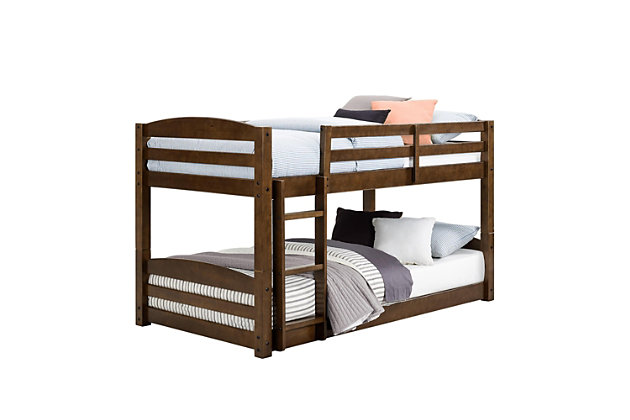 Sleep in style with the customizable, space-saving design of the Atwater Living Aaida Bunk Bed. The increased sleeping capacity is common sense solution for cottages, extended family, out-of-town guests or hosting your child’s rambunctious friends for a sleepover. The Aaida features a mocha finish, clean lines and horizontal slats with a built-in stepladder to access the top bunk. Each bed features its own personal space with easy dependable access in and out. The ultimate space-saver, the Aaida’s multiple configurations also allow it to be set up as a traditional bunk bed or simply as two separate twin beds. The unique floor bunk bed design will allow you to maximize your space while the sturdy, solid construction adds both durability and functionality. Fun, safe and stylish, the Atwater Living Aaida Twin Bunk Bed is the perfect antidote for sleeping multiple people in smaller spaces.Made of wood and engineered wood | Transitional twin size bunk bed made with a solid wood construction. | Easily converts into two separate twin size beds. Each bed is designed to accommodate a standard twin size mattress (sold separately). Bed slats included and no box spring required. | Small space living approved. Promises optimal support and durability with sturdy integrated ladder and slats. | 1 Year limited warranty | Asssembly required