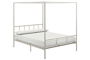 The Novogratz Marion Canopy bed is stylish and classy. Designed with a clean silhouette, this eye-catching piece is crafted in solid and sturdy metal that is stable and durable with secure metal slats that do not require a foundation. It comes with a sophisticated headboard and footboard and with metal side rails and center legs to provide full support and comfort to you and your mattress. The Marion is also practical with 11 inches of clearance beneath the bed, ideal to store things away. Just pair it with the Novogratz Atlas mattress and a comfy duvet and this artfully designed bed frame will become the centerpiece of your room!Stylish and classy design in a clean silhouette. Perfect bed frame to become the centerpiece of your bedroom | Crafted in a sturdy metal frame that includes secured metal slats as well as additional metal side rails and center legs for ensured stability and durability. | Built-in headboard and footboard (bed height is 73"). Clearance beneath the bed can be used for storage (11") | Ships in one box and it is easy to assemble. Available in black and gold in multiple sizes | Assembly required | Does not require a box spring or additional foundation.