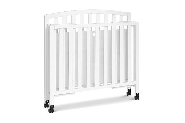The Dylan Folding Portable Mini Crib is the perfect fit for urban living or to leave at grandparents' home. Its er size and rolling wheels allow you to move the crib freely throughout the home. The Dylan’s folding functionality allows you to easily store the crib when not in use or to take with you when you travel. This mini crib is both durable and lightweight and converts to a bed to grow with your baby beyond the nursery years.Greenguard gold certified: this product has been tested for over 10,000 chemical emissions and vocs, undergoing rigorous scientific testing to meet some of the world's most stringent chemical emissions requirements. It contributes to cleaner indoor air, creating a healthier environment for your baby to sleep, play, and grow. | 3-in-1 convertibility: designed to save you the hassle (and extra money!) of buying multiple beds as your little one grows. From rolling bassinet to stationary mini crib, this product also easily folds and converts to a bed (-size conversion kit sold separately) | Grows with baby: 4 adjustable mattress positions that you can lower as your baby begins to sit and stand. We've built this crib to withstand even the most active babies and toddlers and last through your child's teen years | Space efficient: a mini crib is a great alternative for er spaces (such as parents' bedroom & er apartments) or to store at grandparents' house to make traveling back and forth easy for the whole family | Portable: rolling wheels allow you to move the crib around freely and to move aside to clean those hard to reach areas under the crib. Wheels can be locked to keep crib stationary. | Foldable: easily fold the crib and store when not in use or fold it up to take with you when you travel | Bassinet alternative: the american pediatric association recommends co-sleeping for the first 6 months. A mini crib is a more stylish alternative to a pack-n-play and a more long-term solution than a bassinet for keeping your baby closeby as you sleep. | Mattress compatibility: while this crib fits any standard size mini crib mattress, it best fits with davinci’s line of firm comfort, greenguard gold, waterproof mini mattresses. Includes 1" waterproof pad.