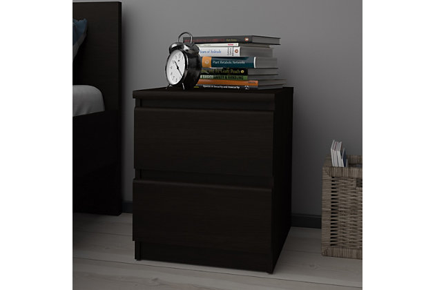Nightstands often become hub centers for day to day living in a bedroom. With space for a lamp, alarm clock, best-selling novel, cell phone, or other items needed within arm’s reach, the Scottsdale 2 Drawer nightstand is an essential organizational component of your room. Two drawers with metal drawer slides provide out of sight storage for necessities. Perfect for use with low platform beds or in smaller spaces, the simple design merges with a variety of decors. The foil finish is easy to clean, stain, and scratch resistant making the Scottsdale nightstand an ideal choice for families or college living.  Combine this nightstand with other Scottsdale bedroom pieces to complete the look.Assembly is required | Contemporary design that provides a modern and cohesive ambience | Two roomy drawers provide extra space to place reading glasses, magazines, small electronics and more | Handle-free drawers | Extra high drawer sides with good extensions to ensure spaciousness and functionality | Drawers retract smoothly on metal glides with built-in safety stops | Product is shipped in 1 box | Made from engineered wood | Made in Denmark | Scandinavian look and design | Includes assembly manual and all necessary hardware and fasteners.  Components are pre-drilled and pre-cut ready for easy assembly!