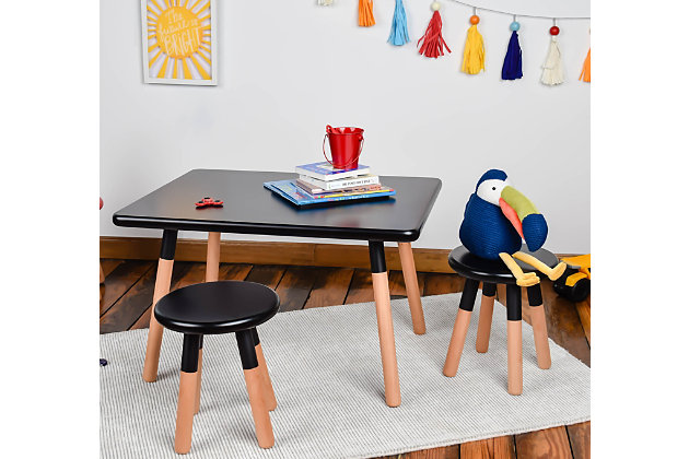 Give your little ones their own perfectly-sized activity space with the ACEssentials Beech Wood Kids Activity Table and Stool Set. This set includes one table and two coordinating stools to provide a creating, playing, and dining space for your toddler and their friends. The spacious table surface is great for crafting, reading, solving puzzles, eating, homework and more. This versatile kids furniture set is great for use in any home, playroom, day care, or school environment. The durable MDF beech wood construction with solid legs adds stability, and is completely plastic and PVC-free. The dipped white painted accent adds a touch of style and color. This table and chair set is designed with rounded corners and edges for added safety and worry-free play time. It is also easy to wipe clean and sanitize for everyday messes. Designed with kids in mind, the square table measures 18.9" x 31.4" x 23.6" and each stool measures 13" x 11.8" x 11.8" when assembled, providing comfortable seating for your little one. Add a modern flair to your child's space with the ACEssentials Beech Wood Kids Activity Table and Chair Set!Sturdy MDF made from Beech Wood | Sold as a set (one table and two stools)