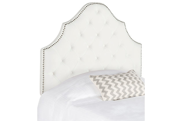 Furnishings in the hotel suite that's a second home to the residents of Buckingham Palace inspired this tufted velvet headboard. Designed for the boudoir of a modern princess, its upholstery is adorned with polished nailhead detail.Made with wood | Upholstered in tufted white polyester over padding | Nailhead trim with polished silvertone finish | Headboard only | Assembly required