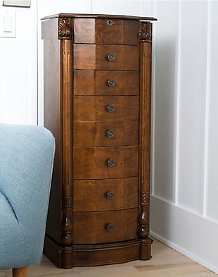 Stately and elegant, the Antoinette Standing Jewelry Armoire is a Hives & Honey favorite. The rich walnut finish beautifully accentuates the natural wood grain, while antiqued brass drawer pulls and decorative trim work adds sophistication to this piece, making it look like an expensive family heirloom. 7 spacious pull out drawers feature various divided compartments, ensuring that there is a place for everything in your extensive jewelry collection. 2 hidden doors found on either side of the Antoinette offer a convenient place to store necklaces while keeping them tangle-free. If you have go-to pieces, keep them in the locking top compartment for easy access, which features ring rolls, divided compartments, and a vanity mirror.Made with wood | Antiqued walnut finish | Finish is hand-applied in a multi-step process by a team of artisans | 7 drawers are lined and padded | Drawers with separated compartments | Lift the lid to reveal a mirror, divided compartments and ring rolls | Lock and key feature | Assembly required