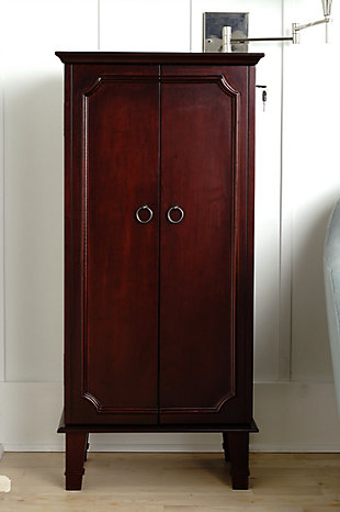 Have you been looking for a fully locking jewelry Armoire…well here it is!! The Carlson Jewelry Armoire organizes your necklaces, earrings, rings, wallets, clutches and more. Made as a one-of-kind piece you’ll fall in love with the French-style doors, bronze hardware and antiqued finish.Made with wood | Lined with linen | Top lid lifts to reveal additional storage, ring rolls and a full frame mirror | 7 storage drawers; 3 drawers with divided compartments, 4 drawers include open storage | 16 necklace hooks on sides of doors | Assembly required