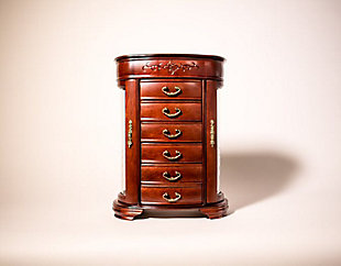 Well, hello there, little beauty. You’ll say that every time you walk up to the Patricia Jewelry Cabinet (and when you look in the mirror, just inside the top lid). And what a little beauty it is with the rich antiqued mahogany finish, antiqued brass drawer pulls, rounded design, and etched floral flourishes. A top hinged lid opens to reveal 10 ring rolls and 4 divided compartments. Two etched glass doors hold necklace hooks and more storage. The six spacious drawers provide the perfect spot for bracelets, watches, necklaces, or other jewelry.Made with wood | Fully lined with anti-tarnish felt | 6 drawers | Hinged lid opens to a vanity mirror, 10 ring rolls and 4 divided compartments | Assembly required