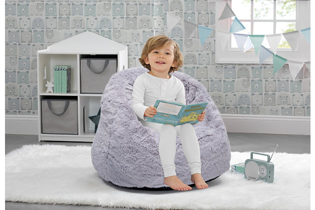 The Cozee Fluffy Chair by Delta Children will be the best seat in the house. Stuffed with a shredded foam that contours to your child's body, it delivers more comfort and support than traditional bean bag chairs. The perfect chair for reading, playing or snuggling, the plush faux fur cover and supportive back help give kids an oh-so-cozy spot to call their own, and its lightweight design means it can go anywhere your child goes. The innovative foam construction will keep its shape for long-lasting use that will accommodate to your child's needs, year after year. Plus, the chair's non-slip bottom ensures it stays in place. It's the perfect chair for your playroom, bedroom or living room. Delta Children was founded around the idea of making safe, high-quality children's products affordable for all families. They know there's nothing more important than safety when it comes to your child's space. That's why all Delta Children products are built with long-lasting materials to ensure they stand up to years of jumping and playing. Plus, they are rigorously tested to meet or exceed all industry safety standards.PREMIUM MATERIALS: Generous foam filling is durable and will keep its shape longer than a traditional bean bag chair. Supportive back and seat surround your child in comfort. Non-slip bottom keeps chair in place | COZY FEEL: Plush, sensory-friendly cover is super-soft. Non-crinkly design is quieter than bean bag chair. Machine washable cover-wash before use | EASY TO UNBOX: Chair ships in super-small box. Expands quickly and keeps its shape. Once unboxed chair expands 5x (may take 24 hours to fully expand) | PORTABLE + VERSATILE COMFORT: Lightweight chair can be moved from room to room. Comfier than a bean bag chair. Great for bedrooms, playrooms, basements, gaming, studying or dorm rooms. Recommended for ages 2 to 6 years (holds up to 60 lbs.) | CHILD SAFE ZIPPER: To prevent kids from opening the chair, we use a childproof zipper that comes without a pull, it can only be opened using a paperclip. Chair meets or exceeds government and ASTM safety standards | For any questions regarding Delta Children products, please contact consumersupport@deltachildren.com Monday to Friday, 8:30 a.m. to 6 p.m. (EST)