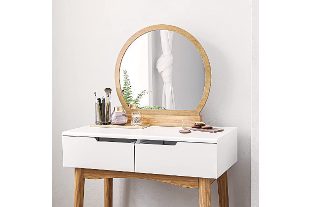 This vanity set covers provides just what you need to get ready. Two sliding, deep drawers keep makeup supplies and hairbrushes at your fingertips, and a spacious tabletop leaves you a large space for the items in your beauty routine.Includes vanity table and upholstered stool | Made of wood and metal | 2 drawers | Rounded mirror | Spacious top | Assembly required