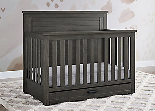 The Caden 6-in-1 Convertible Crib with Trundle Drawer by Simmons Kids is designed with lasting, farmhouse style. The crib's softy textured finish is hand-applied for a rustic look while the included trundle drawer adds additional functionality with space to store extra blankets and other bed linens. Plus, it will accommodate your baby from birth through their teenage years. This crib's grow-with-me design features three adjustable height levels that allow the crib to be lowered as your child begins to stand, and it converts from a crib to a toddler bed, sofa, daybed and full size bed with headboard and footboard or headboard only. Available in Rustic gray, Rustic Mist and Rustic Acorn. Daybed Rail and Trundle included; Toddler Guardrail, Full Size Bed Rails sold separately. Producing the finest furniture for over 80 years, Simmons Kids has always been committed to the safety of every family. All Simmons Kids cribs are JPMA certified, are rigorously tested to meet or exceed all industry safety standards.SAFE OPTION FOR YOUR BABY: This crib is JPMA certified to meet or exceed all safety standards set by the CPSC and ASTM. We know chemicals have no place in your nursery, so we use a non-toxic multi-step painting process that is lead and phthalate safe | 6-IN-1 CONVERTIBLE CRIB WITH TRUNDLE: Crib converts to a toddler bed, daybed, sofa, full bed with headboard and footboard and to a full bed with headboard only (Daybed rail included). Included under crib trundle storage drawer features 4 wheels for easy operation | FARMHOUSE FINISH: Crib is available in Rustic gray, Rustic Mist or Rustic Acorn. The softy textured finish is hand applied. Due to varying grains and natural variations in the wood, no two pieces are exactly alike | ADJUSTABLE HEIGHT: Adjustable height mattress support with 3 convenient positions to grow with your baby. ACCESS RAIL DIMENSIONS: From Floor: 36.25"; From Top Mattress Support Position: 17.5"; From Bottom Mattress Support Position: 27.75" | COORDINATING ITEMS: Pair with any Delta Children Dresser in the same color, for the perfect baby nursery. Uses a standard size crib mattress (sold separately). To ensure the perfect fit pair your crib with a Delta Children, Serta, Beautyrest or Simmons Kids crib mattress