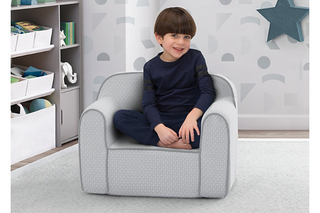 Cozy up to Serta's iComfort Memory Foam Chair for Kids. A snuggly spot for reading, watching TV or just hanging out, this supremely comfy chair features a memory foam seat for additional comfort and a luxurious quilted slipcover. The slipcover is removable and machine washable for easy cleaning. Perfect for the playroom, living room or your child's bedroom, this kids' foam chair goes anywhere they do--the lightweight design with handle on top is easy to move from room to room. Recommended for ages 18 months+.SO COZY: This kids' foam chair features a luxurious quilted slipcover and memory foam seat. Lightweight design with handle is easy to move from room to room | EASY TO CLEAN: Removable and machine washable slipcover zips off for easy cleaning | USE IT ANYWHERE: Kids can use this foam chair anywhere for anything, whether its reading, playing video games, watching tv, or just relaxing, this chair will keep them comfortable the entire time | PERFECT SIZE: Assembled dimensions: 25"W x 18"D x 20.5"H. Seat Size: 13"L x 15"W. Assembly required; foam inserts easily slip into the fabric cover. Recommended for ages 18 months+ | SAFE OPTION: This comfy kids' chair meets or exceeds all safety standards