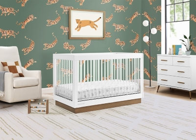 Crib with acrylic outlet sides