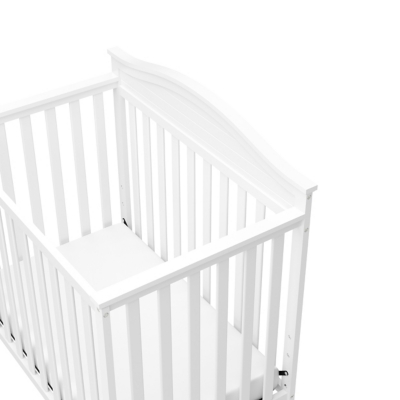 Top-down or angled view of left side of crib