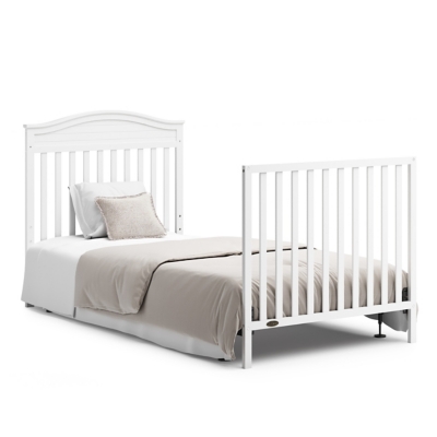 Crib shown with coordinating bed furniture