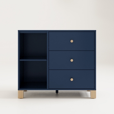 angled view of navy blue dresser showing drawers and open shelf.