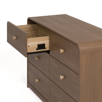 Side view of Santos dresser with open top left drawer showing interior