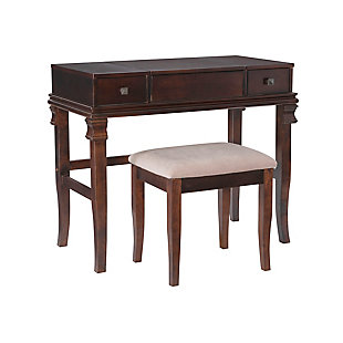 Richly traditional, but far from ornate, the Angela vanity set with walnut-tone finish is simply delightful. Square, sculptural hardware, decorative appliques and gently flared legs give the straightforward profile elegance and distinction. Flip-top design with safety hinge reveals a mirror and hidden storage. Double drawers keep makeup and more close at hand. What a beautiful addition to a teen’s room, master bedroom or dressing area.Made of rubberwood, maple veneer and engineered wood | Walnut-tone finish | Flip top with safety hinge revealing hidden mirror and open storage | 2 smooth-gliding drawers | Square bronze-tone metal pulls | Cutout for cord management | Ca fire foam padded seat with light beige microfiber upholstery | Assembly required