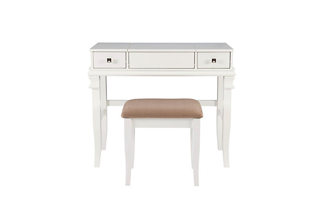 Richly traditional, but far from ornate, the Angela vanity set in white is simply delightful. Square, sculptural hardware, decorative appliques and gently flared legs give the straightforward profile elegance and distinction. Flip-top design with safety hinge reveals a mirror and hidden storage. Double drawers keep makeup and more close at hand. What a beautiful addition to a teen’s room, master bedroom or dressing area.Made of rubberwood, maple veneer and engineered wood | White finish | Flip top with safety hinge revealing hidden mirror and open storage | 2 smooth-gliding drawers | Square bronze-tone metal pulls | Cutout for cord management | Ca fire foam padded seat with light beige microfiber upholstery | Assembly required