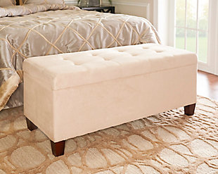 Say shoo to clutter with the Augusta shoe storage ottoman, which does double time as a comfortably upholstered bench. Perfect for a large closet, entryway, mudroom or at the foot of a bed. Richly neutral beige fabric and simply chic styling complement so many interiors. Lift the button-tufted top to reveal a storage compartment lined with side pockets to accommodate your shoe collection.Made with solid wood and engineered wood | Beige microfiber upholstery | Tufted seat | Flip-top with soft close safety hinges opens to storage compartment | Side storage pockets for multiple shoes | Ca fire foam cushion | Exposed feet with espresso finish | Assembly required | Small space solution