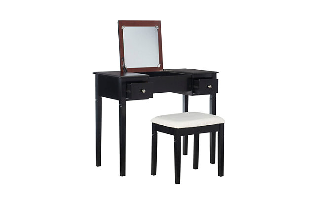 Tight on space, yet need a stylish and functional vanity for a bedroom or dressing area? The Sloan vanity set can easily fit into a small space because it takes up minimal floor space. In a traditional design and style, it offers ample storage and display space. Its two side storage drawers are handy for keeping makeup and accessories organized, while the flip top showcases a mirror and ample interior storage space. In addition to functionality, you'll love its sophisticated style full of classic elements like rich black cherry finish, elegant accented legs and simple lines. A matching stool in cozy upholstery is included.Made of wood, engineered wood, foam and fabric | Black cherry finish | Large flip top mirror | 2 smooth-gliding side drawers | Flip top reveals ample interior storage space | Includes plush padded stool upholstered in beige fabric | Assembly required