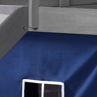 close-up of bed edge and blue fabric, showing joint and fabric detail