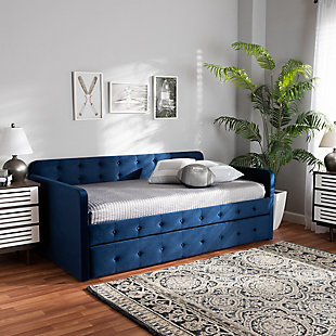 Set up an elegant environment for lounging and sleeping with the Jona daybed. Made in Malaysia, this wooden daybed is upholstered in a soft, luxurious velvet fabric and padded with foam for the utmost comfort. Sleek track arms display a modern look, while button tufting lends a classic touch. Designed with both style and function in mind, the Jona is fitted with a roll-out twin size trundle bed to provide easy accommodation for overnight guests. Requiring assembly, the Jona is well suited for guest rooms and children's rooms.Roll-out twin-size trundle bed | Constructed from MDF wood and engineered wood | Upholstered in velvet fabric and padded with foam | Button tufted