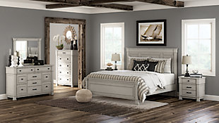 Given just enough distressing for family heirloom charm, the Jennily queen panel bed is a mastery in modern farmhouse style. The ultimate choice for a dreamy bedroom retreat, its antiqued white finish is wonderfully easy on the eyes. Sturdy silhouette with bold pilasters gives this beautiful bed such a substantial presence, with picture frame moulding adding elegant detail. Mattress and foundation/box spring available, sold separately.Made of solid wood and engineered wood | Includes headboard, footboard and rails | Antiqued white finish | Assembly required | Foundation/box spring required, sold separately | Mattress available, sold separately | Estimated Assembly Time: 70 Minutes