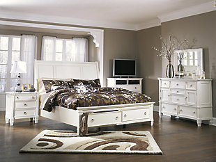 Fresh, crisp and classic. Whether you’re going for shabby chic or cottage quaint, the Prentice queen sleigh storage bed is dressed to impress. Flat-panel design on headboard is clean and classic. Two drawers at the foot of the bed have you covered with handy storage. Mattress available, sold separately.Made of veneers, wood and engineered wood | Satin nickel-tone hardware | Footboard with 2 smooth-operating drawers with dovetail construction | Assembly required | Bed does not require a foundation/box spring | Small Space Solution | Mattress available, sold separately | Estimated Assembly Time: 10 Minutes