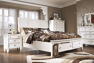 There’s nothing quite like the crisp, fresh look and feel of elegant furnishings in white. Whether you’re going for shabby chic or cottage quaint, the Prentice Cal king sleigh storage bed is dressed to impress. Flat-panel design on headboard is clean and classic. Two drawers at the foot of the bed have you covered with handy storage. Mattress available, sold separately.Made of veneers, wood and engineered wood | White finish | Satin-nickel-finish hardware | Footboard with 2 smooth-operating drawers with dovetail construction | Assembly required | Foundation/box spring required, sold separately | Mattress available, sold separately | Estimated Assembly Time: 10 Minutes