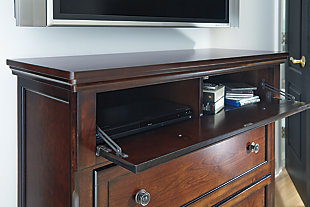 The quality craftsmanship is clear to see. The classic design elements—including antiqued hardware and bun feet—are easy to love. Satisfying your taste for traditional furnishings, the Porter media chest is elegant without looking fussy. Two ample drawers keep your movie collection and odds and ends in a central place. Drop door reveals two cubbies—ideal for your cable box and DVD or Blu-ray player.Made of veneers, wood and engineered wood | Bun feet | Hand-finished | Cutouts for wire management | Assembly required | 2 storage cubbies behind drop-down front | 2 smooth-operating drawers with dovetail construction and cedar bottoms | Dark bronze-tone hardware | Small Space Solution | Includes tipover restraint device