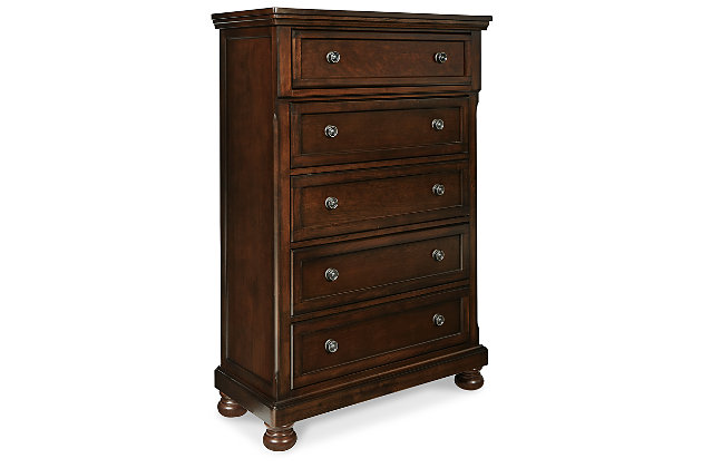 The quality craftsmanship is clear to see. The classic design elements—including antiqued hardware and bun feet—are easy to love. Satisfying your taste for traditional furnishings, the Porter chest of drawers is elegant without looking fussy. Five roomy drawers keep your wardrobe organized in style.Made of veneers, wood and engineered wood | Bun feet | Hand-finished | Dark bronze-tone hardware | 5 smooth-operating drawers with dovetail construction | Top drawer with felt bottom; bottom drawers with cedar bottoms | Assembly required | Small Space Solution | Includes tipover restraint device