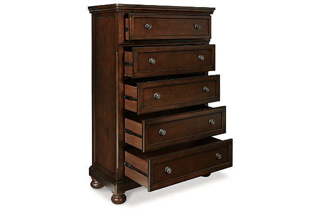 The quality craftsmanship is clear to see. The classic design elements—including antiqued hardware and bun feet—are easy to love. Satisfying your taste for traditional furnishings, the Porter chest of drawers is elegant without looking fussy. Five roomy drawers keep your wardrobe organized in style.Made of veneers, wood and engineered wood | Bun feet | Hand-finished | Dark bronze-tone hardware | 5 smooth-operating drawers with dovetail construction | Top drawer with felt bottom; bottom drawers with cedar bottoms | Assembly required | Small Space Solution | Includes tipover restraint device