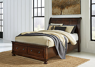 The quality craftsmanship is clear to see. The classic design elements—including bun feet—are easy to love. Satisfying your taste for vintage inspiration, the Porter queen sleigh storage bed is elegant, without looking fussy. Two built-in drawers at the foot of the bed are great for storing linens and throws. Mattress sold separately.Made of veneers, wood and engineered wood | Includes headboard, footboard with storage, cross slats and rails | Hand-finished | Dark bronze-tone hardware | 2 smooth-operating drawers with dovetail construction and cedar bottoms | Footboard with bun feet | Assembly required | Small Space Solution | Bed does not require a foundation/box spring | Mattress available, sold separately | Estimated Assembly Time: 10 Minutes
