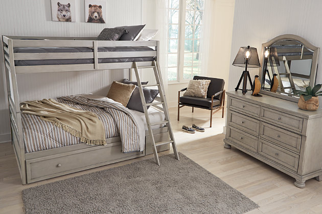 Double the space means twice the fun, and that’s what they’ll enjoy with the Lettner twin-over-full bunk bed. Forever classic design details—under bed storage, a sturdy ladder and safety rails—are paired with a burnished gray finish that elevates the look with modern sensibility.Made of veneers, wood and engineered wood | Includes horizontal rails | Top bunk with side rails | Sturdy ladder leads to top bunk | The Consumer Product Safety Commission states top bunks not be used for children under 6 years of age | Included slats eliminate need for foundations/box springs | Mattresses available, sold separately | Roomy under bed drawer for storage | Assembly required | Estimated Assembly Time: 145 Minutes