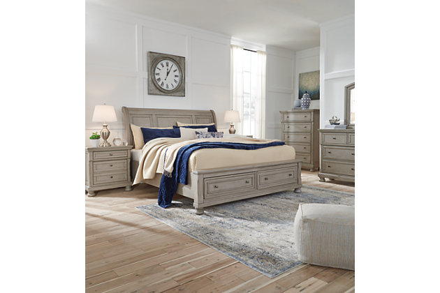 Satisfying your taste for tradition, the Lettner sleigh bed with storage sports serene sophistication. Forever classic design details—inlaid panels, silvertone patina hardware and bun feet—are so easy to love. Burnished light gray finish elevates the look with modern sensibility. Two roomy drawers keep your essentials organized in style. Mattress available, sold separately. Made of veneers, wood and engineered wood | Includes headboard, footboard with storage, slats and rails | Silvertone patina hardware | 2 smooth-gliding drawers with dovetail construction | Mattress available, sold separately | Bed does not require a foundation/box spring | Assembly required | Estimated Assembly Time: 70 Minutes