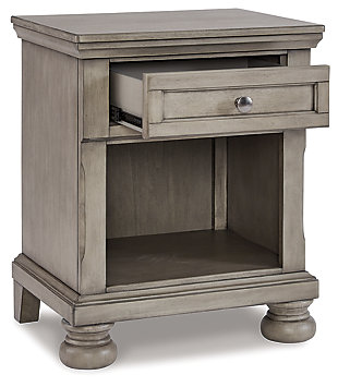 Satisfying your taste for tradition, the Lettner nightstand sports serene sophistication. Forever classic design details—inlaid panels, silvertone patina hardware and bun feet—are so easy to love. Its burnished light gray finish elevates the look with modern sensibility. The nightstand's drawer and open cubby space beautifully accommodate your bedside storage needs. Made of veneers, wood and engineered wood | Silvertone patina hardware | Single smooth-gliding drawer with dovetail construction | Top drawer felt-lined | Open storage space | Assembly required | Estimated Assembly Time: 15 Minutes