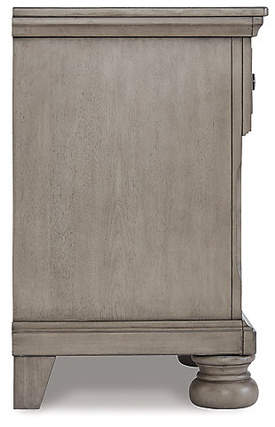 Satisfying your taste for tradition, the Lettner nightstand sports serene sophistication. Forever classic design details—inlaid panels, silvertone patina hardware and bun feet—are so easy to love. Its burnished light gray finish elevates the look with modern sensibility. The nightstand's drawer and open cubby space beautifully accommodate your bedside storage needs. Made of veneers, wood and engineered wood | Silvertone patina hardware | Single smooth-gliding drawer with dovetail construction | Top drawer felt-lined | Open storage space | Assembly required | Estimated Assembly Time: 15 Minutes