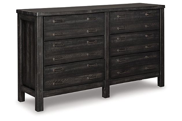 The Baylow dresser is dressed to impress with a unique twist on casually elegant farmhouse interiors. Its square, “stocky” styling is richly enhanced with plank-effect details and a distressed vintage black finish that’s not too light and not too heavy. Inspired by the old-fashioned printer’s cabinet, it includes six smooth-gliding drawers loaded with antiqued zinc-tone bar pulls.Dresser only | Made of veneers, wood and engineered wood | 6 smooth-gliding drawers with dovetail construction (top 2 drawers felt lined) | Antiqued zinc-tone hardware | Includes tipover restraint device
