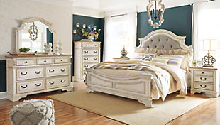Elevating the art of traditional cottage styling, the Realyn dresser and mirror set is your dream bedroom retreat realized. This brilliantly crafted bedroom ensemble wows with dramatic scalloped details and an antiqued two-tone aesthetic blending a chipped white with a distressed wood finished top for added charm. Framed drawer fronts and decorative corbels add refinement, while bail pulls in a dark bronze-tone finish lend a classic touch.Made of veneers, wood and engineered wood, with cast resin components | Antiqued two-tone finish | 7 smooth-gliding drawers with dovetail construction | Dark bronze-tone hardware | Mirror attaches to back of dresser | Assembly required | Includes tipover restraint device | Estimated Assembly Time: 35 Minutes