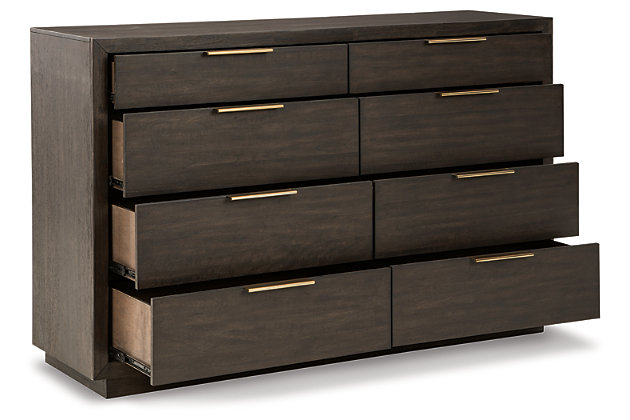 If you find that sleek and simple does the trick, we think you’ll agree: the Bruxworth dresser has the look perfected. Always on trend espresso-tone finish and clean lines ensure an aesthetic that never goes out of style. Eight drawers generously accommodate your wardrobe needs. Picture frame moulding and goldtone pulls are on the cutting edge of cool.Dresser only | Made of wood, mango veneer and engineered wood | Dark espresso brown finish | 8 smooth-gliding drawers with dovetail construction; top drawers have felt-lined bottom | Metal pulls with goldtone finish | Assembly required