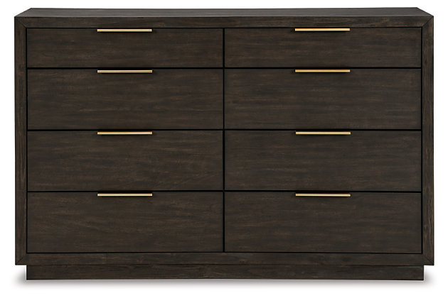 If you find that sleek and simple does the trick, we think you’ll agree: the Bruxworth dresser has the look perfected. Always on trend espresso-tone finish and clean lines ensure an aesthetic that never goes out of style. Eight drawers generously accommodate your wardrobe needs. Picture frame moulding and goldtone pulls are on the cutting edge of cool.Dresser only | Made of wood, mango veneer and engineered wood | Dark espresso brown finish | 8 smooth-gliding drawers with dovetail construction; top drawers have felt-lined bottom | Metal pulls with goldtone finish | Assembly required