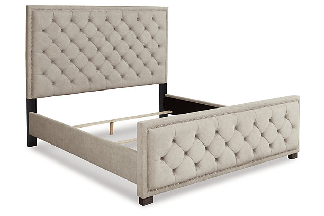 Few pieces demand attention like the Bellvern upholstered bed. In addition to opulent button-tufting, its clean contemporary lines and simple symmetry have a minimalist appeal that fits perfectly in an upscale transitional setting.Includes headboard, footboard and rails | Textured gray polyester upholstery | Nailhead accents | Assembly required | Foundation/box spring required, sold separately | Mattress available, sold separately | Estimated Assembly Time: 70 Minutes