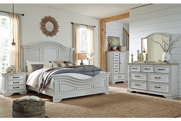 A well-edited merger of coastal style with modern farmhouse, the Teganville 4-piece bedroom set with two-tone finish is rich with distressing for gently weatherworn appeal. Quality crafted with a thick pine veneer top, picture frame drawers and bracket feet, this bedroom set brings coastal farmhouse elements seamlessly into the here and now.Includes California king panel headboard, footboard, rails and dresser | Bed and dresser made of acacia wood, pine and birch veneers and engineered wood | Dresser only | Dresser with 7 smooth-gliding drawers with dovetail construction; top drawer felt-lined | Dresser with metal pulls with antiqued black finish | Assembly required | Estimated Assembly Time: 85 Minutes
