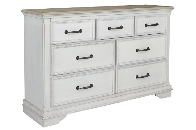 A well-edited merger of coastal style with modern farmhouse, the Teganville 4-piece bedroom set with two-tone finish is rich with distressing for gently weatherworn appeal. Quality crafted with a thick pine veneer top, picture frame drawers and bracket feet, this bedroom set brings coastal farmhouse elements seamlessly into the here and now.Includes California king panel headboard, footboard, rails and dresser | Bed and dresser made of acacia wood, pine and birch veneers and engineered wood | Dresser only | Dresser with 7 smooth-gliding drawers with dovetail construction; top drawer felt-lined | Dresser with metal pulls with antiqued black finish | Assembly required | Estimated Assembly Time: 85 Minutes