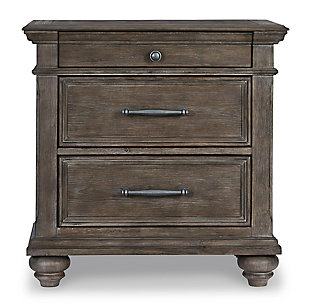 Homey. Hearty. Heavenly hued. Luring with a distressed weathered gray finish and substantial mouldings for great presence, the Johnelle nightstand is sure to make your homestead feel that much more like home. Solid wood is beautified with elm veneers for a master suite masterpiece made for years of satisfaction. Dark pewter-tone nailhead trim adds to the richly rustic aesthetic.Made of elm veneers, acacia wood and engineered wood | Distressed weathered gray finish | 3 smooth-gliding drawers with dovetail construction; top drawer felt-lined | Dark pewter-tone hardware | Includes tipover restraint device | Estimated Assembly Time: 15 Minutes